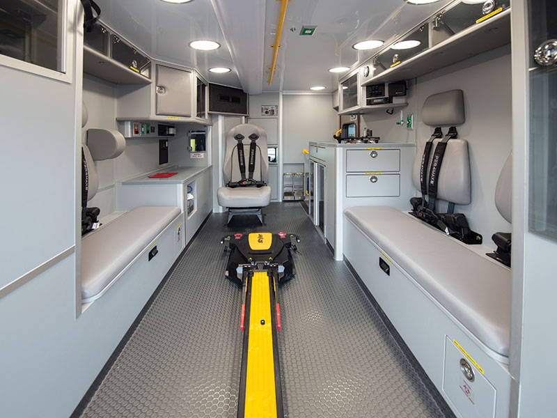 Inside of ambulance showing safety mided cabinet design